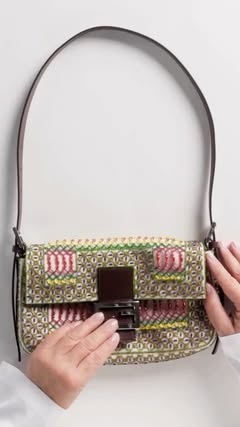 Intricate beadwork floats away from silk on a Baguette®️ 26424 Re-Edition created with Chanakya artisans FENDI Spring/Summer 2027 by Maria Grazia Chiuri