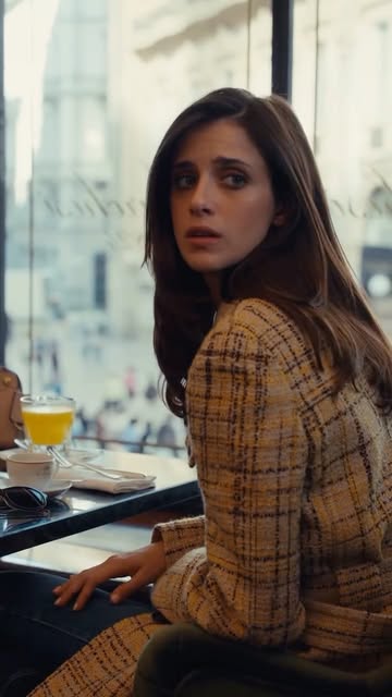 Prada Ambassador Benedetta Porcaroli moves through Prada Galleria, from Marchesi 1824, the quintessence of Milanese café culture, to Osservatorio Fondazione Prada, an open platform for visual experimentation and resea…