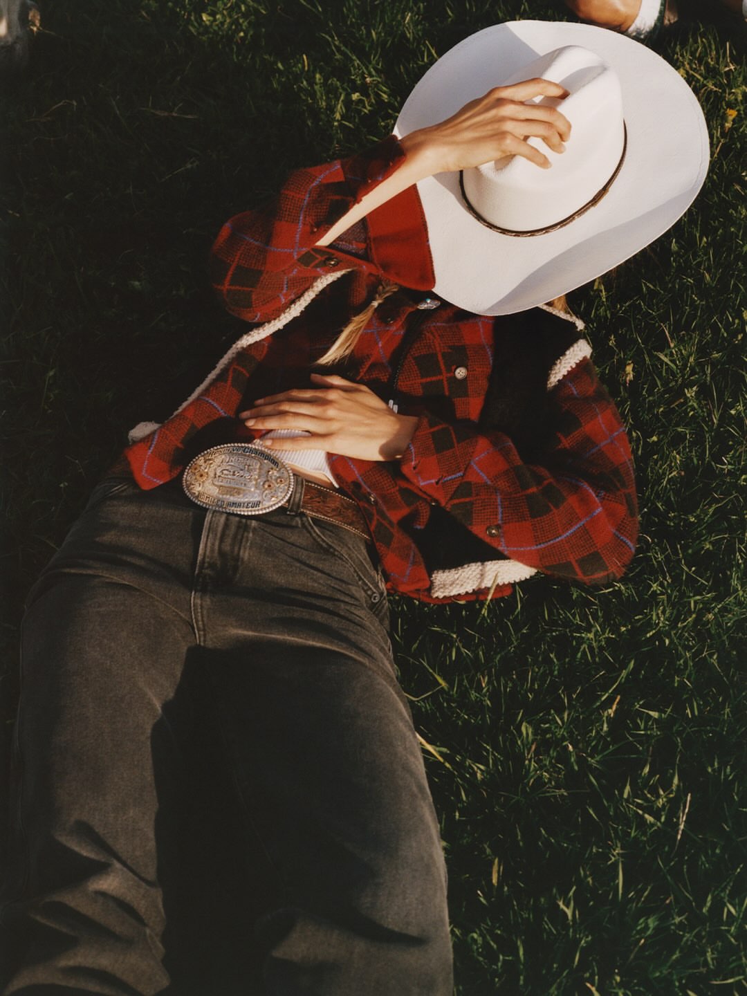 Plaid, revisited. Gigi wearing the Dylan Plaid Shirt, Grizzly Wrangler Vest, and Weekender Jean in Paris.