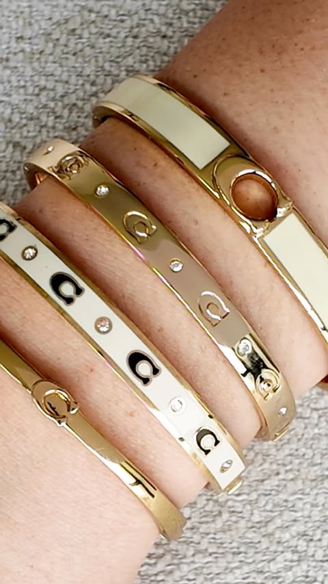 Which bangles are you adding to your stack? #CoachNY #BraceletStack #JewelryCollection