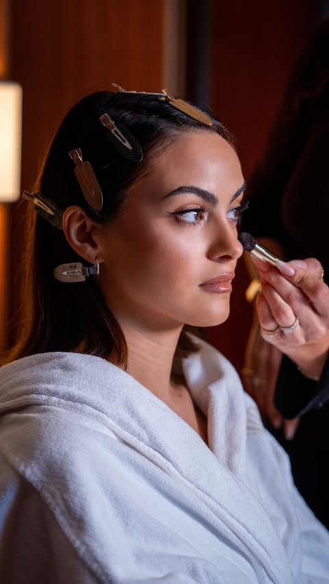 Friend of the house Camila Mendes rushing to the Prada SS27 Womenswear show, with one last touch from Prada Beauty. @camimendes #PradaSS27 #Prada #PradaBeauty #PradaMakeup #PradaFragrances