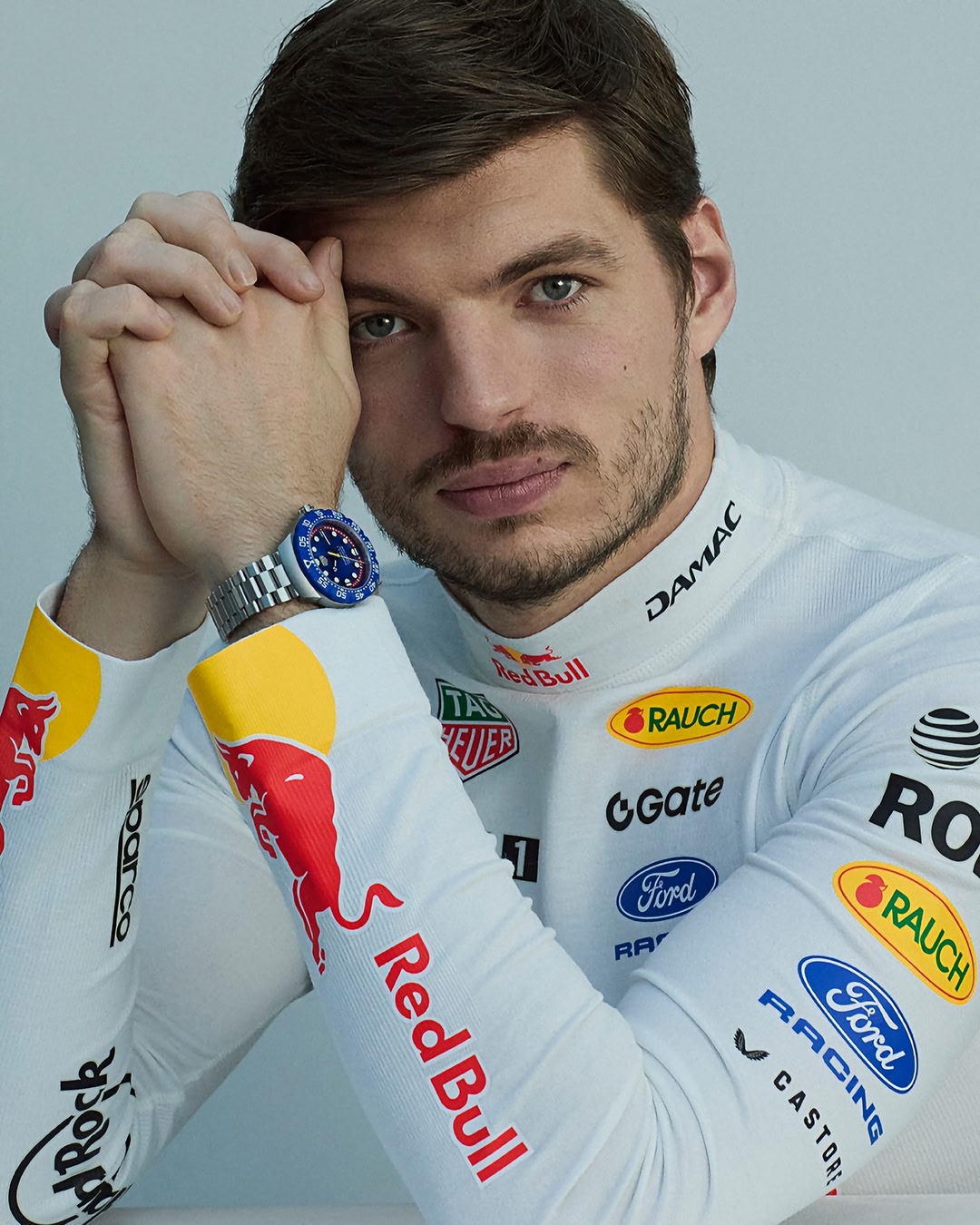 In a Lone Star state of mind.⁣ ⁣ @redbullracing driver @maxverstappen1 is suited up with the new TAG Heuer Formula 1 Solargraph x Oracle Red Bull Racing, featuring bold blue-and-red colors, a sandblasted 38mm steel ca…