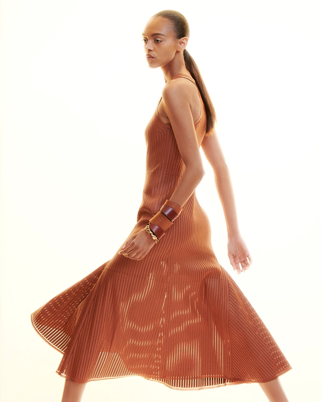 Innovative craftsmanship attuned to elements. Women’s spring-summer 2027 collection created by Nadège Vanhée. The shape of air. A hem lifts, a sleeve fills, a vent opens as each garment is gently set in motion. The in…