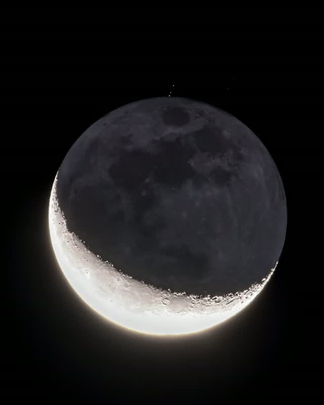 Video and photos by @babaktafreshi | On Tuesday morning I photographed a celestial spectacle right in my backyard, near Boston. Hidden behind the moon for an hour, Jupiter reappeared from the dark night side of the mo…