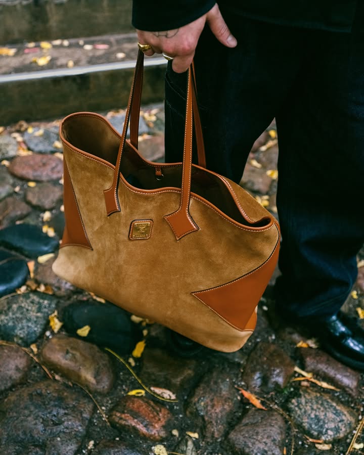A Dia in Berlin Elegantly finished with diamond-inspired stitching, the Dia Shopper carries all the essentials for @david___kosock’s city stroll after a long day at the studio. Adding a touch of color, the removable i…