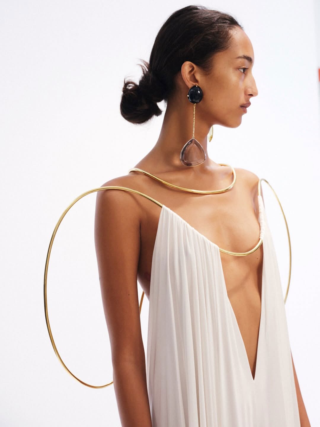 Mona. The white suspended dress. Givenchy by Sarah Burton