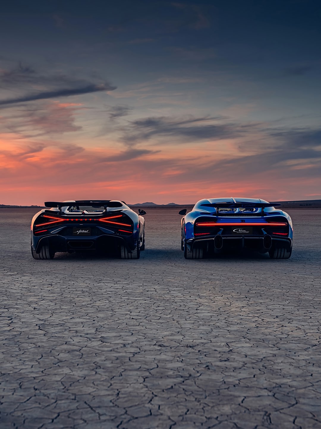 Beneath the setting desert sun, two BUGATTI legends come together. The 99th MISTRAL and the 500th CHIRON – the end of two chapters and the beginning of a lasting legacy. #BUGATTI #W16Mistral #CHIRON – WLTP: bugatti.li…
