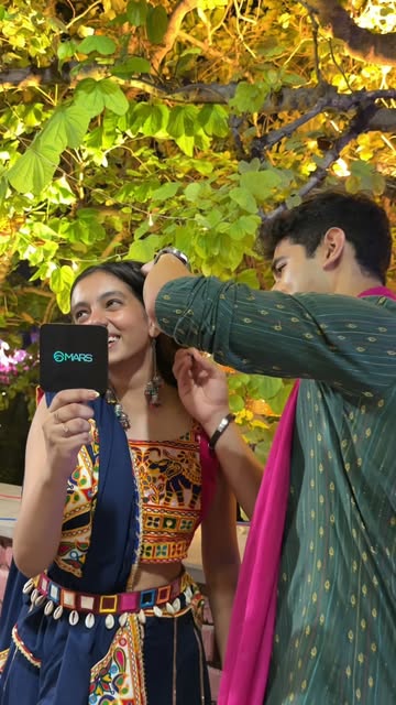 Pov: he never forgets to carry your essentials, especially on Navratri 🥹💄 . . . #marscosmetics #viral #cutecouple #beauty #makeup { happy navratri, navratri, cute couple reel, couple videos, cute couple, makeup, tre…