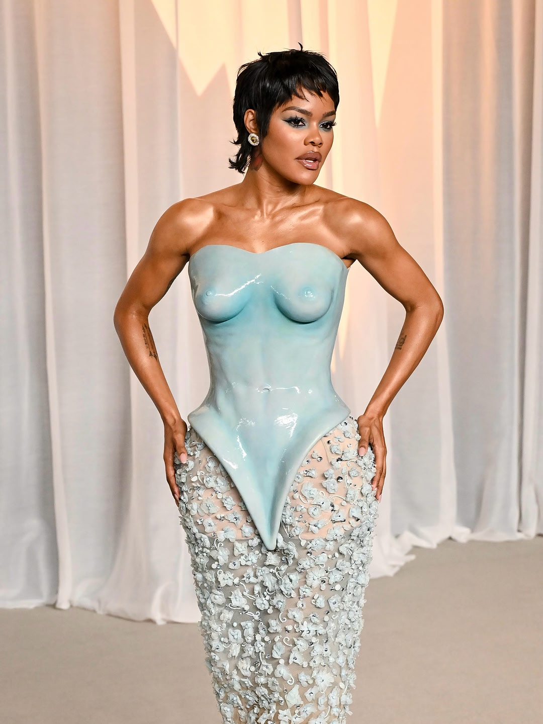 TEYANA BLUE @TeyanaTaylor wears Schiaparelli Haute Couture Fall/Winter 2026-2027, designed by @DanielRoseberry, to the 6th Annual Academy Museum Gala. A bustier dress featuring a glazed pale blue silicone molded bodic…