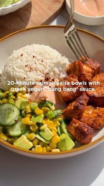 ‘BANG BANG’ SALMON BOWLS ✨ These salmon bowls are loaded with a fresh, crunchy salsa of cucumber, avocado, and charred corn. The whole thing comes together with a bang bang-inspired sauce made with what we had on hand…