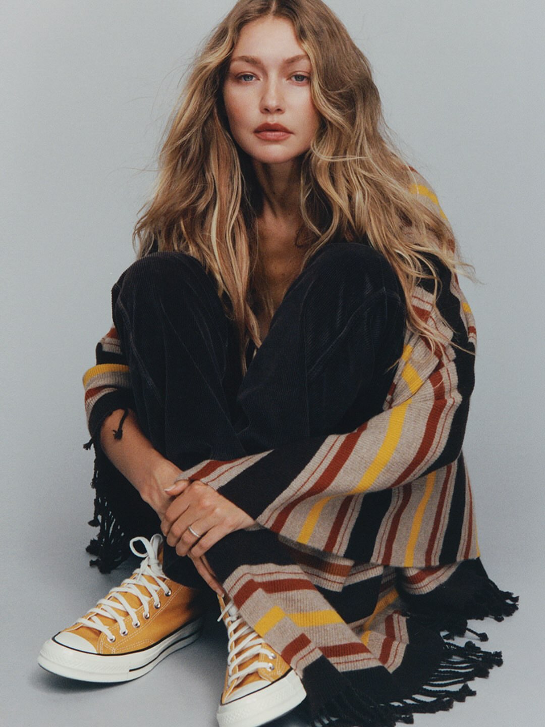 @gigihadid wrapped in our 100% cashmere Striped Blanket.