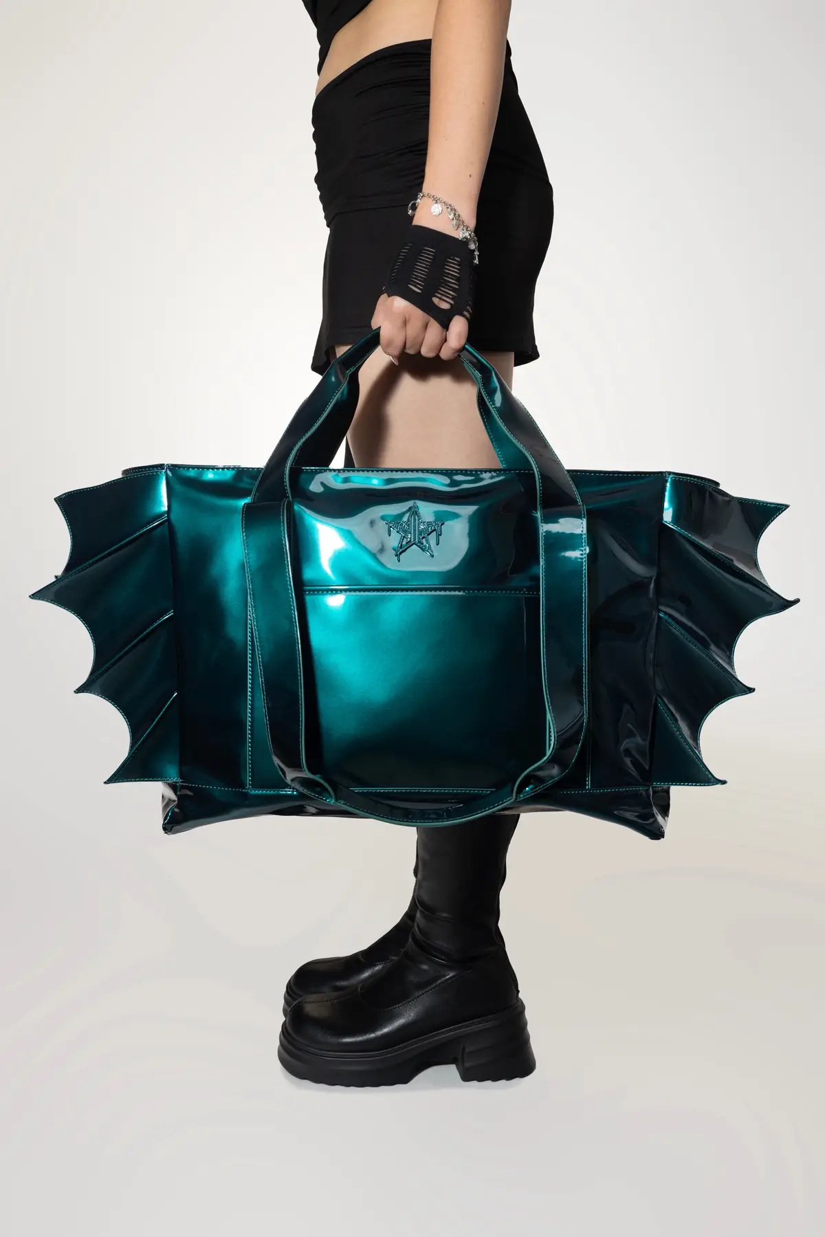 Our Limited Edition Travel Tote Bag in 'Bat Jade Green' is officially HERE!⁠ ⁠⁠ ICONIC Features ⤵️⁠ Glossy Bat Jade Green Vinyl⁠ Top zipper closure + set top handles & shoulder strap⁠ Built-in trolley strap for easy l…