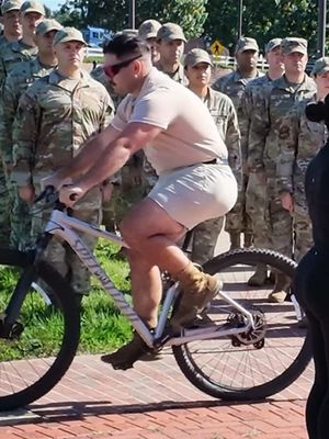 Organizers forgot to block off sidewalk for very important swearing in, oath of enlistment ceremoney at the Delaware national guard. A man accidentally rode his bicycle right through the middle of the ceremony and was…