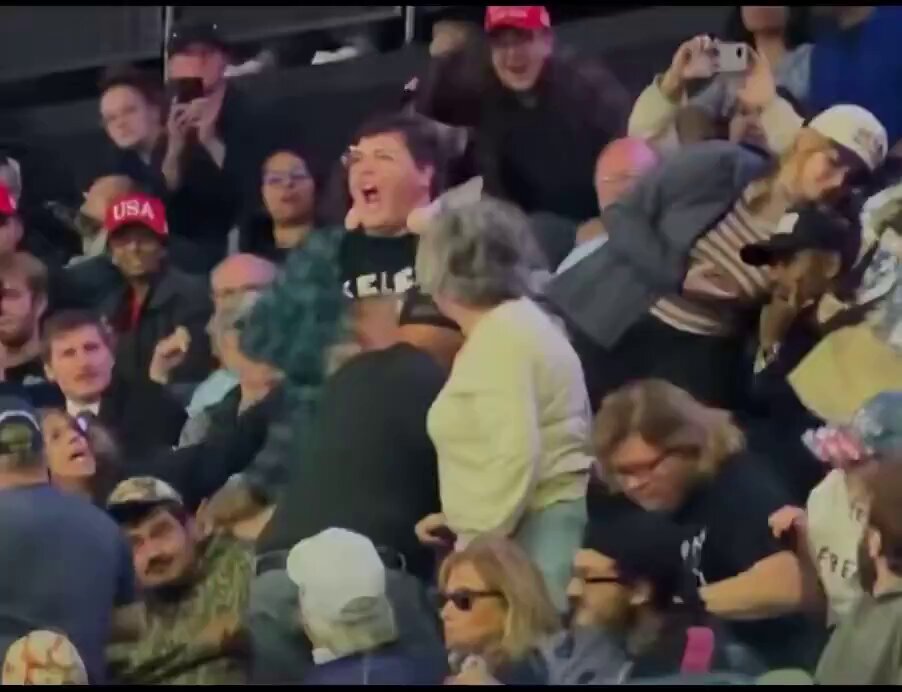 Late stage MAGA is so disgusting and unrecognizable to me, and I find this shocking as one who attended more Trump rallies than I can count. A woman with a “Release The Epstein Files” shirt stands at a Trump rally sho…