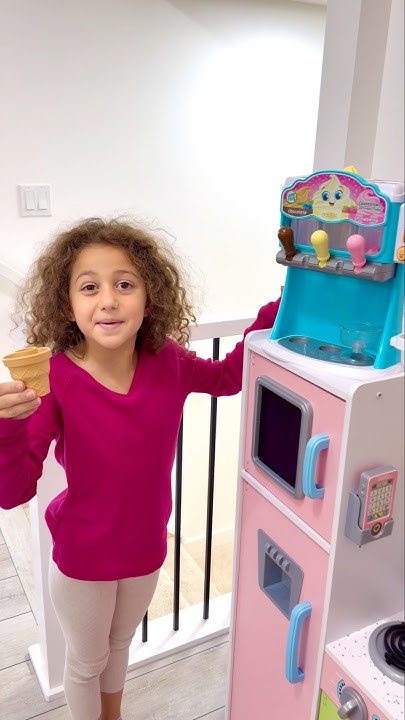 Rhia makes Sierra happy sharing ice cream